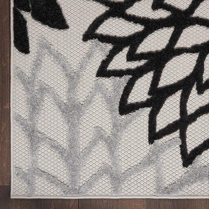 Nourison Aloha 114" x 156" Fabric Indoor/Outdoor Rug in Black/White Finish