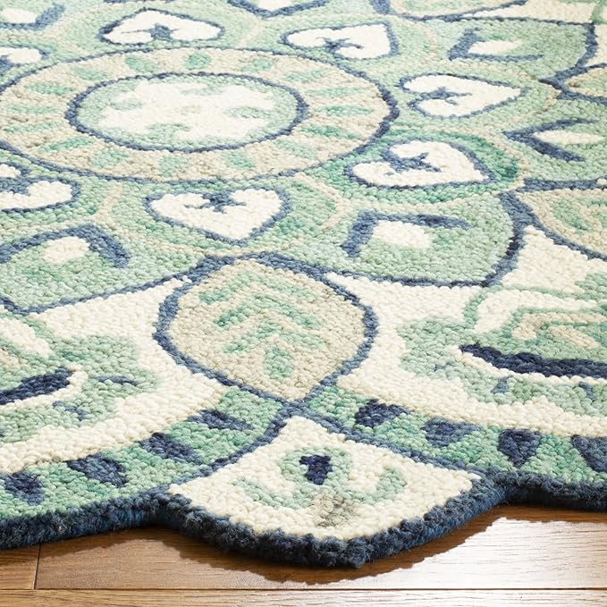 SAFAVIEH Novelty Collection Area Rug - 5' Round, Ivory & Blue, Handmade Boho Floral Rustic Country Wool, Ideal for High Traffic Areas in Living Room, Bedroom (NOV604M)