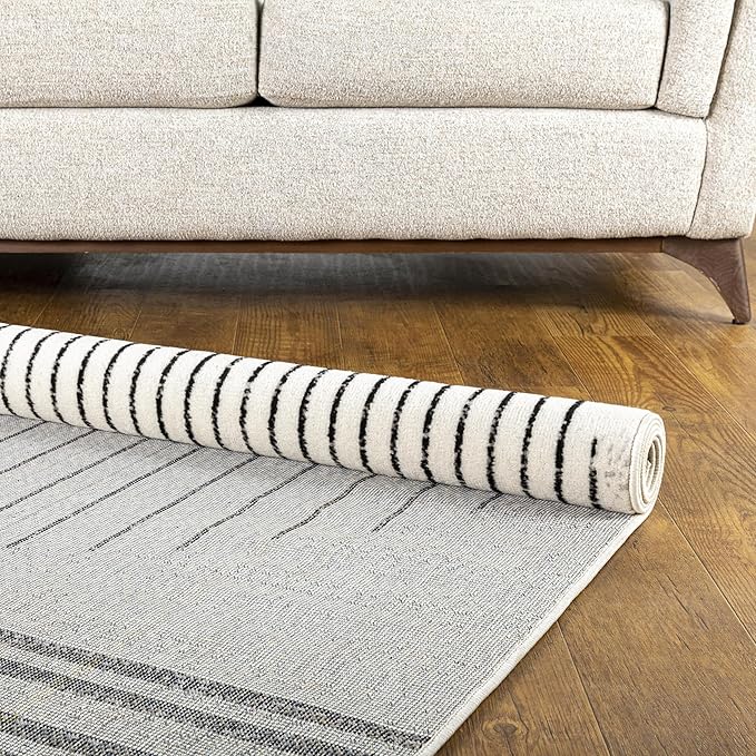 Livabliss Penrod Modern Geometric Area Rug, 4'3" x 5'7", Black/Ivory